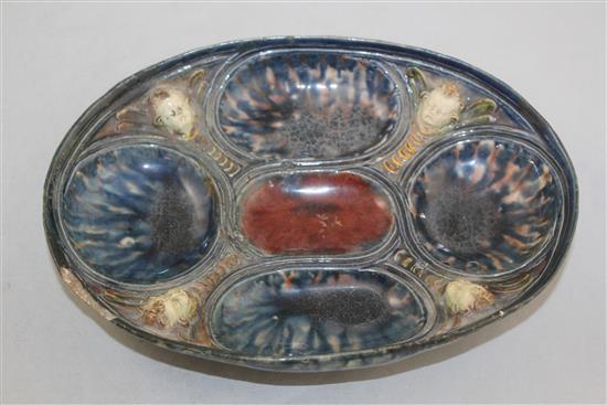 A French Palissy style lead glazed earthenware oval dish, 16th / 17th century, 23cm, rim chip and restoration